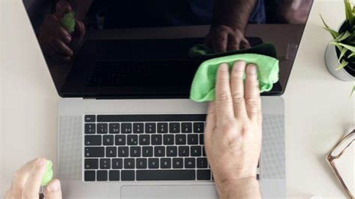 Can I use a wet wipe to clean my laptop screen?