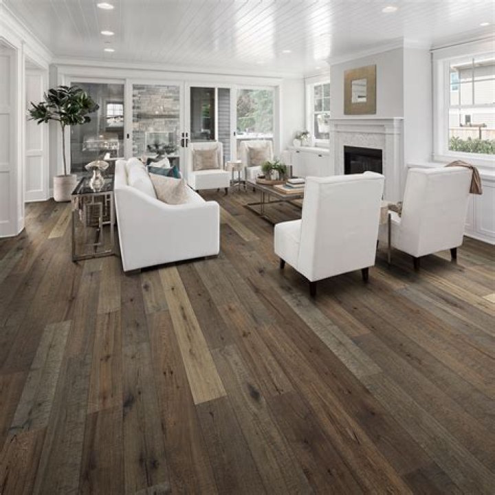 How do you decorate a room with hardwood floors?