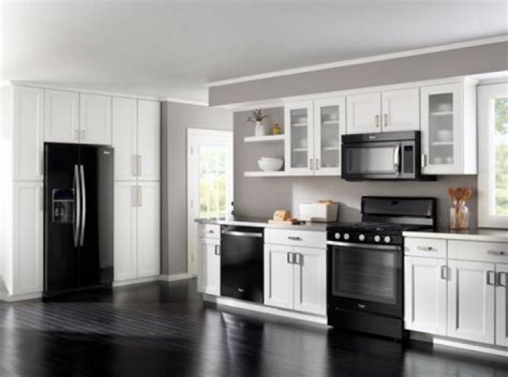 What color kitchen cabinets go best with black appliances?
