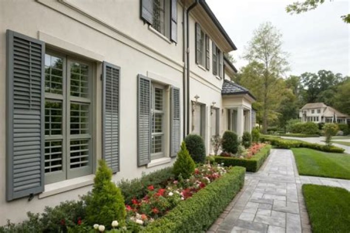 What is the purpose of shutters on a house?